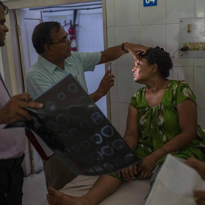 As India grieves train crash that killed 275, relatives try to identify bodies of loved ones
